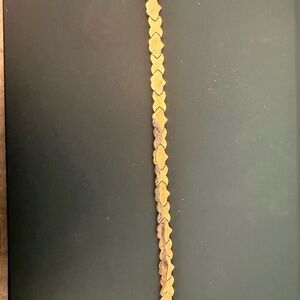 7 in bracelet Ss and 10k gold hearts and kisses